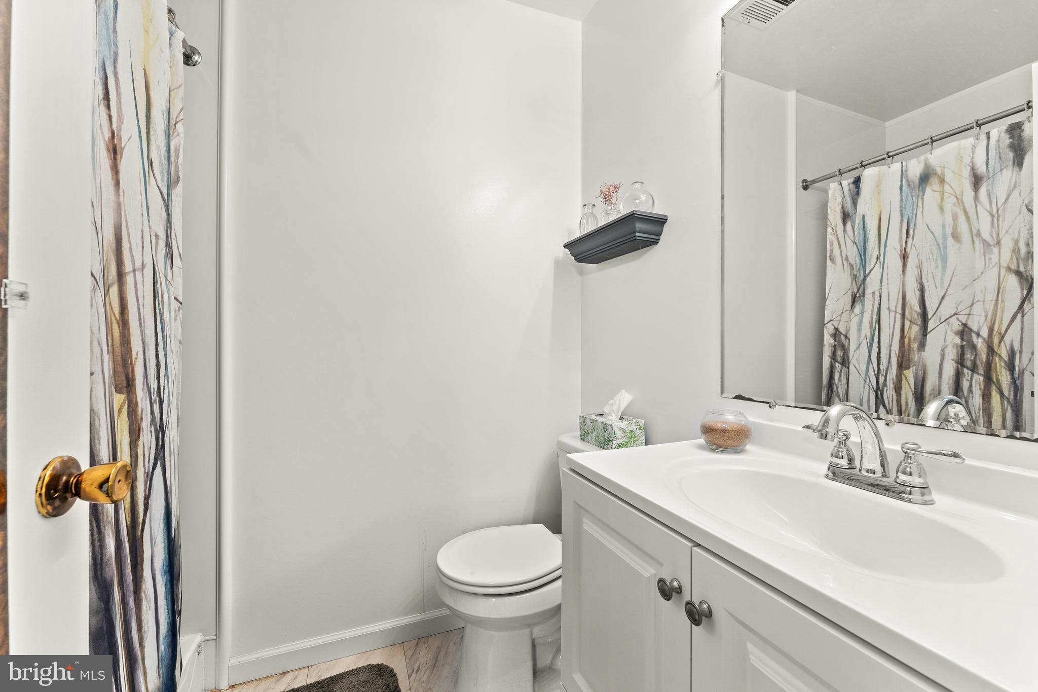 7202 Danny Lane Manassas, VA 20112 - Photo 27 of 54 a bathroom with a sink toilet and shower