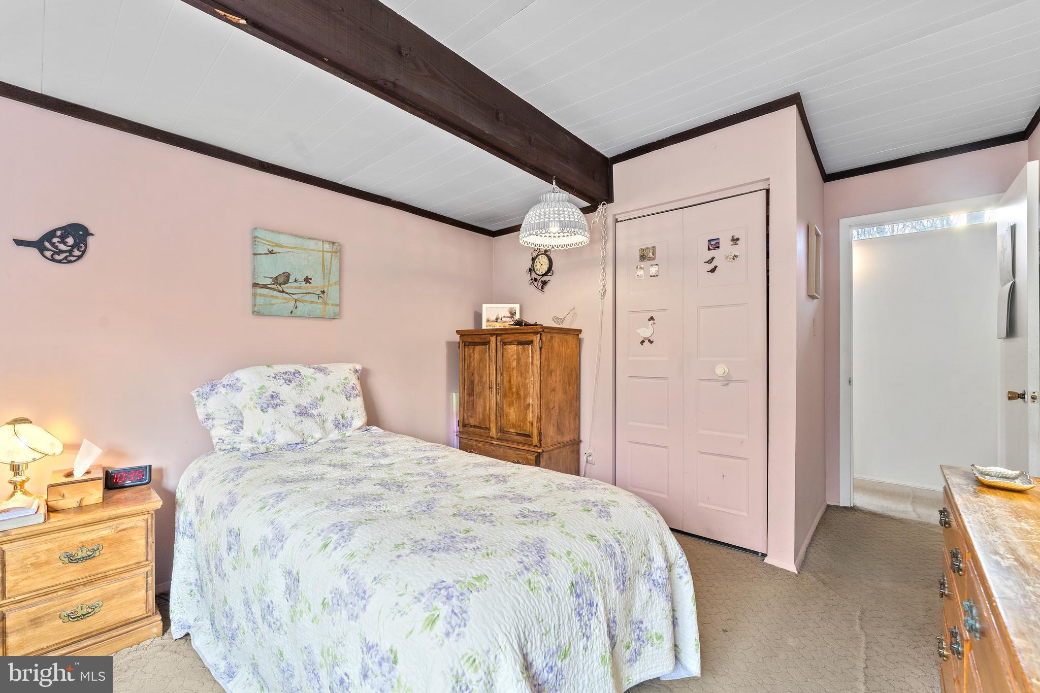 7202 Danny Lane Manassas, VA 20112 - Photo 29 of 54 a bedroom with a bed and a closet