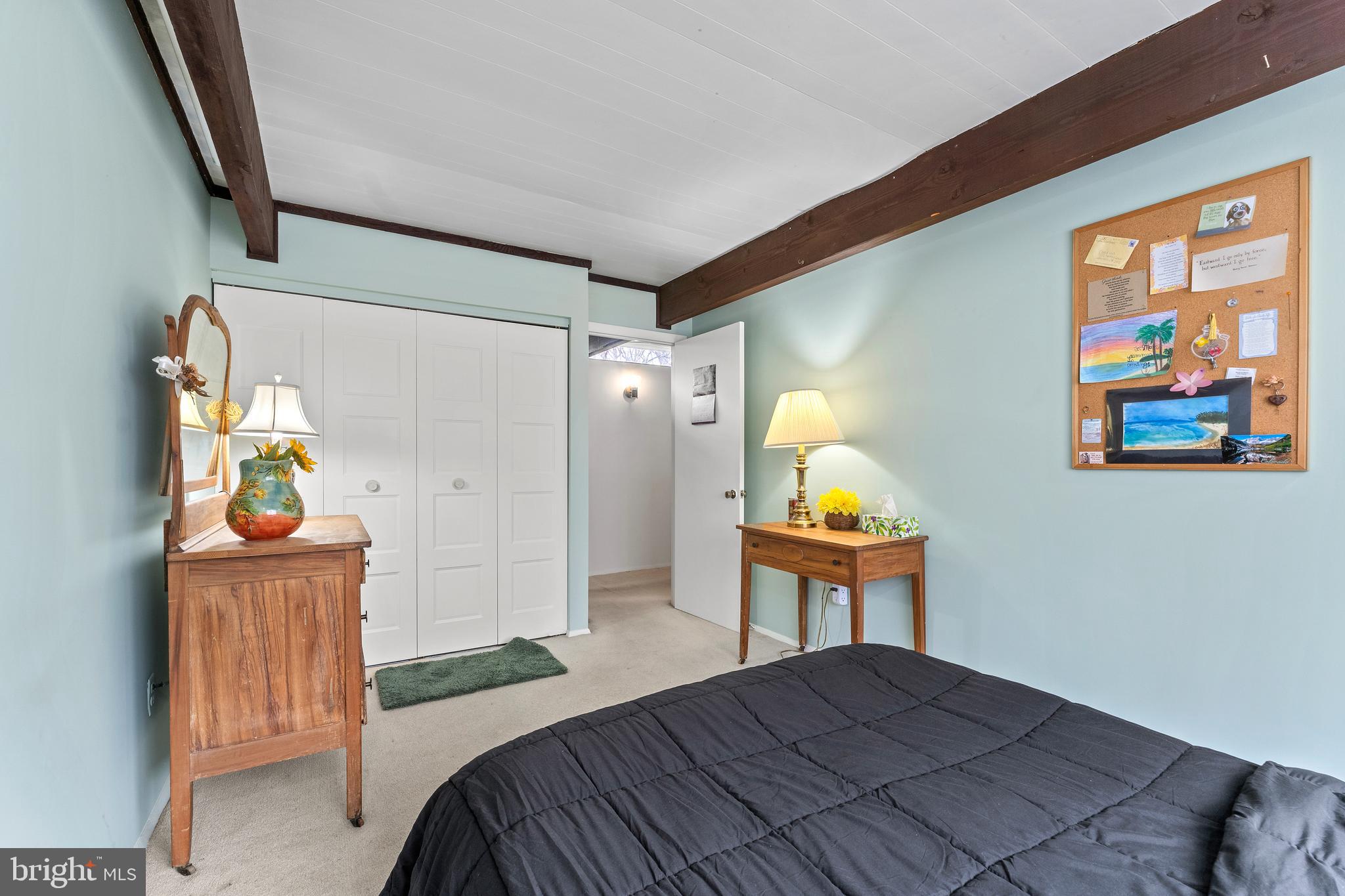 7202 Danny Lane Manassas, VA 20112 - Photo 33 of 54 a bedroom with a bed and a painting on the wall