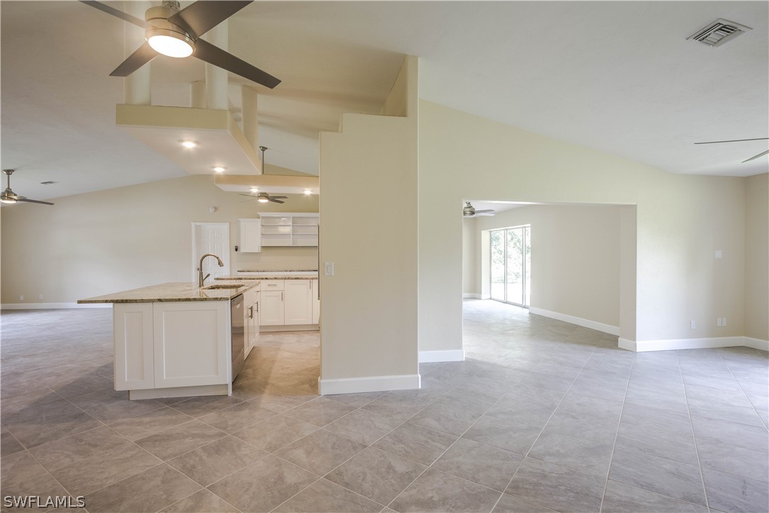 2871 Styles Road Alva, FL 33920 - Photo 13 of 33 a view of a kitchen with a sink and a window