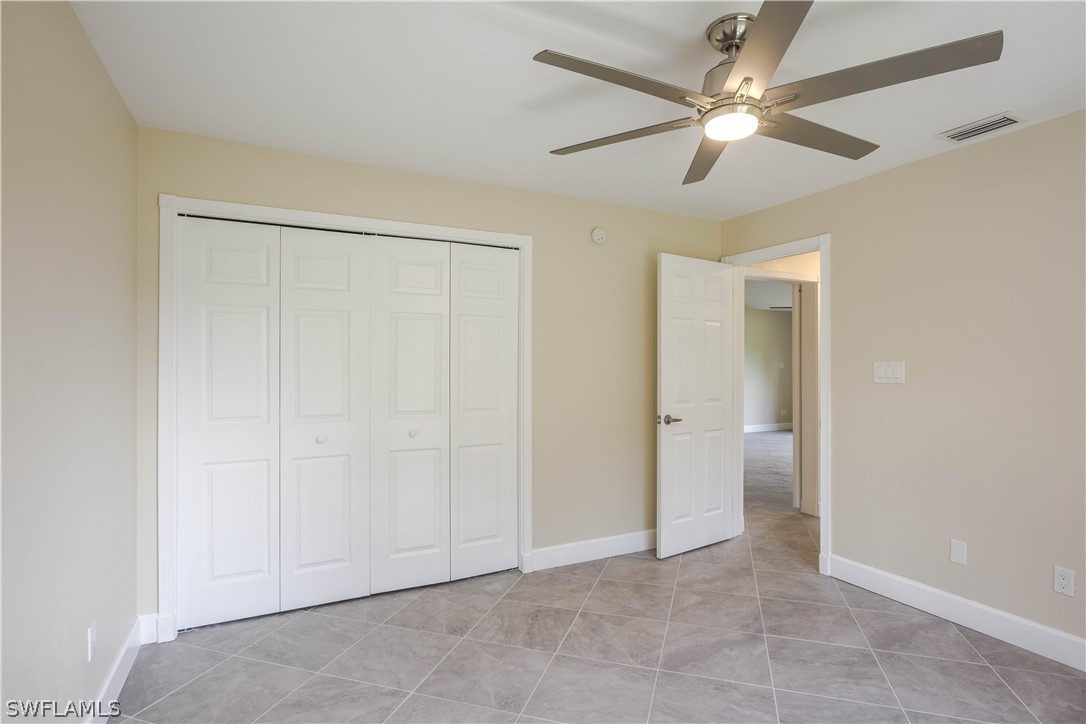2871 Styles Road Alva, FL 33920 - Photo 16 of 33 wooden floor in an empty room