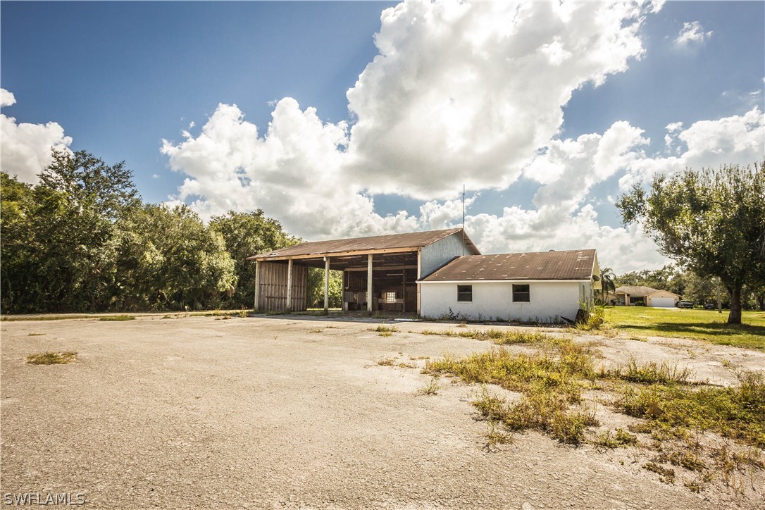 2871 Styles Road Alva, FL 33920 - Photo 28 of 33 a view of a house with a yard