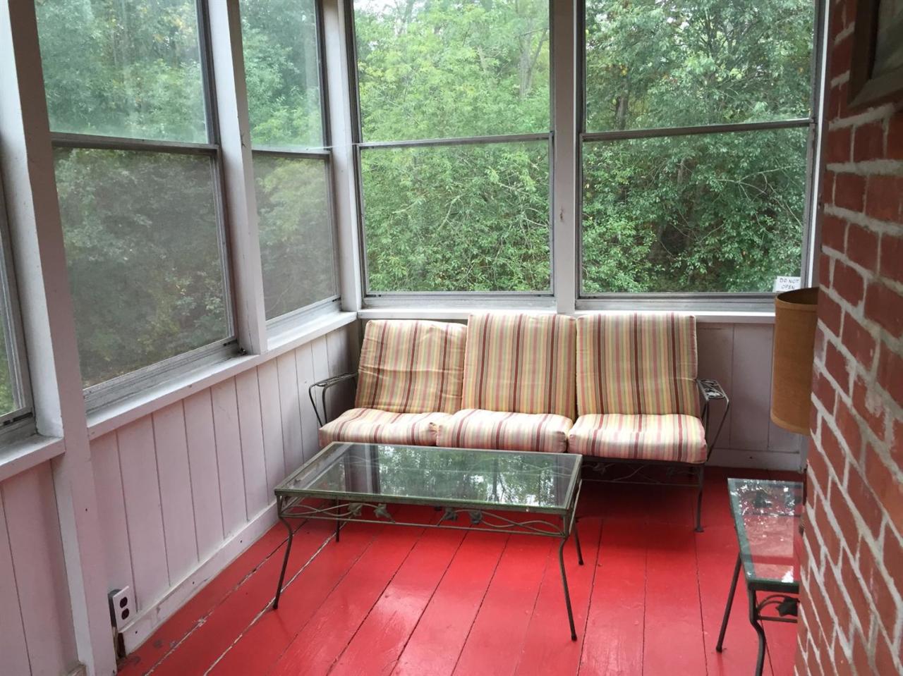 65 Mill Hill Road Wellfleet, MA 02667 - Photo 12 of 17 a view of a two chairs in the balcony