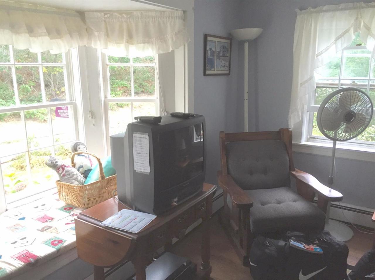 65 Mill Hill Road Wellfleet, MA 02667 - Photo 6 of 17 a living room with furniture and a window