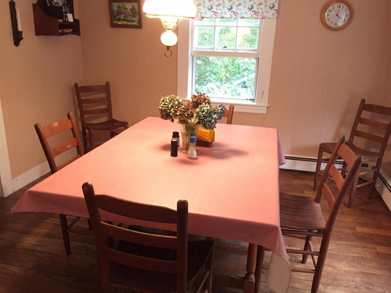 65 Mill Hill Road Wellfleet, MA 02667 - Photo 7 of 17 a dining room with furniture and window