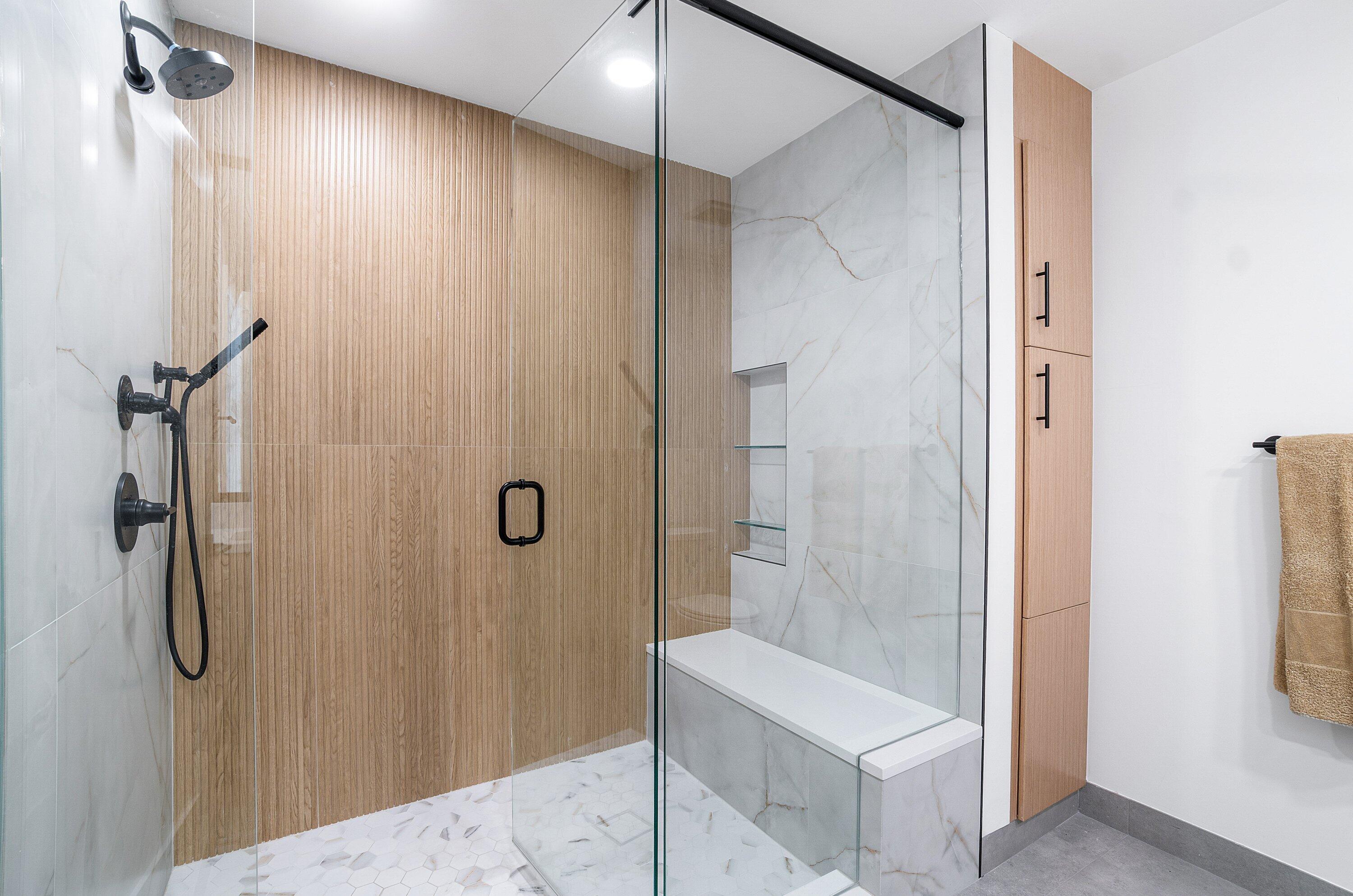 5082 Lake Catalina Drive, Unit A Boca Raton, FL 33496 - Photo 17 of 35 a bathroom with a shower and a glass door