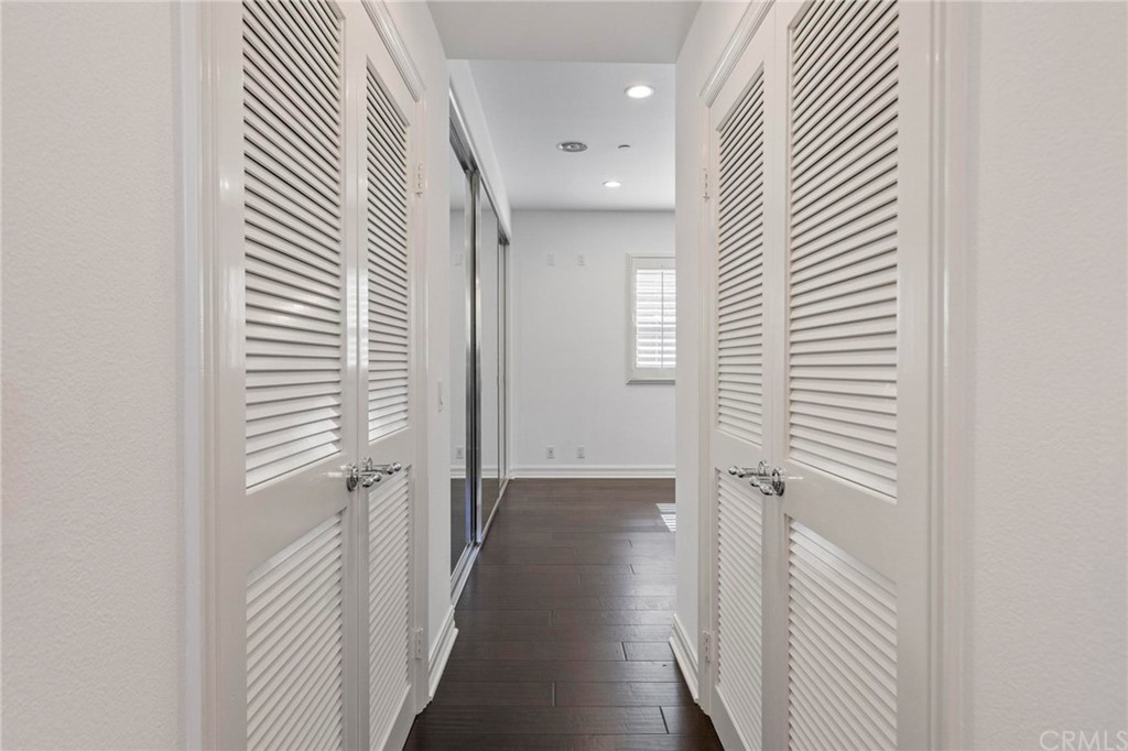 3 Seabluff Newport Beach, CA 92660 - Photo 46 of 75 a view of a hallway with a white door