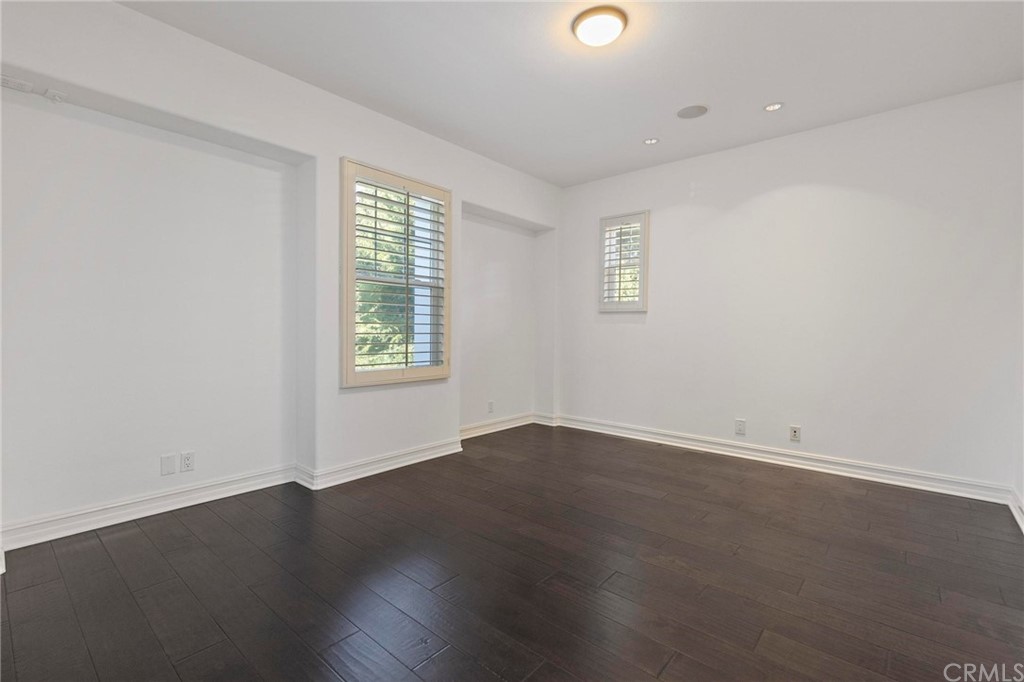 3 Seabluff Newport Beach, CA 92660 - Photo 61 of 75 an empty room with wooden floor and windows