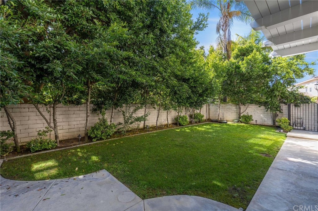 3 Seabluff Newport Beach, CA 92660 - Photo 70 of 75 a view of a backyard with large trees
