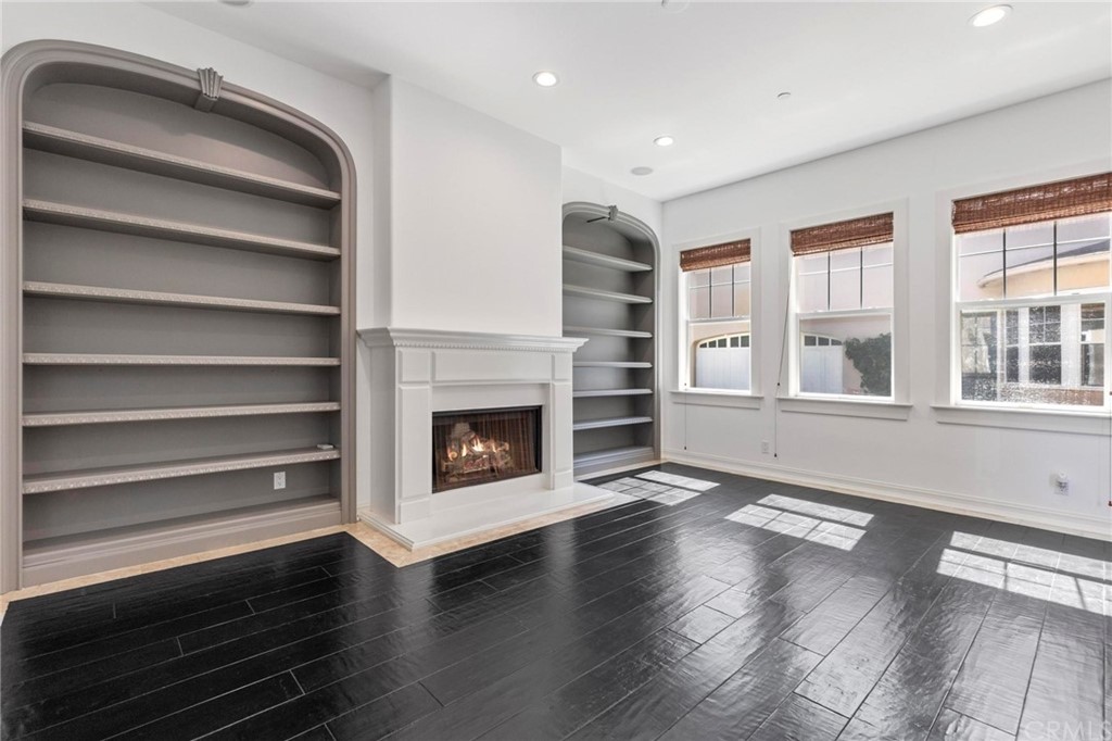 3 Seabluff Newport Beach, CA 92660 - Photo 9 of 75 a living room with furniture and a fireplace