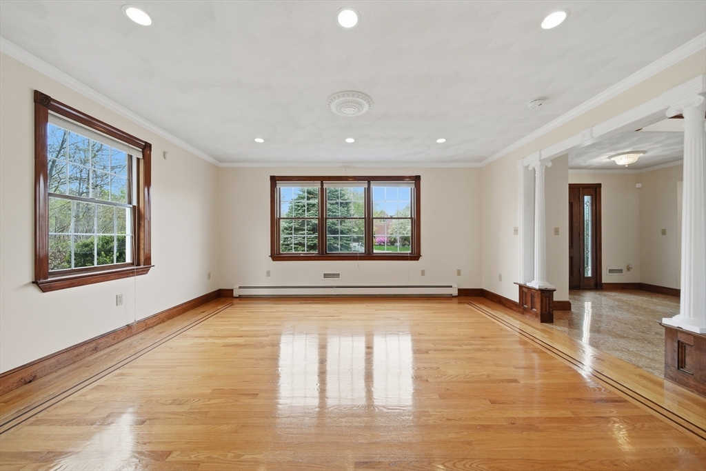 131 Range Heights Road Lynn, MA 01904 - Photo 29 of 36 a view of an empty room with glass door and a window