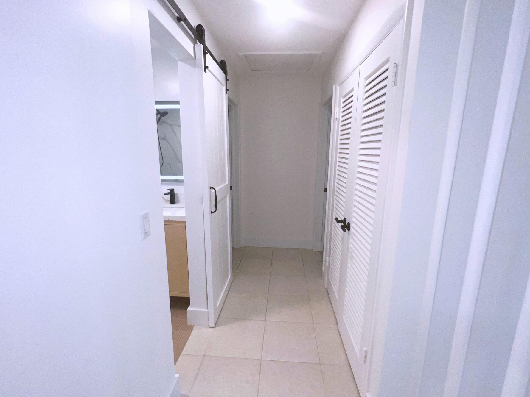 1260 Manor Drive Riviera Beach, FL 33404 - Photo 50 of 56 Hallway w large linen closet