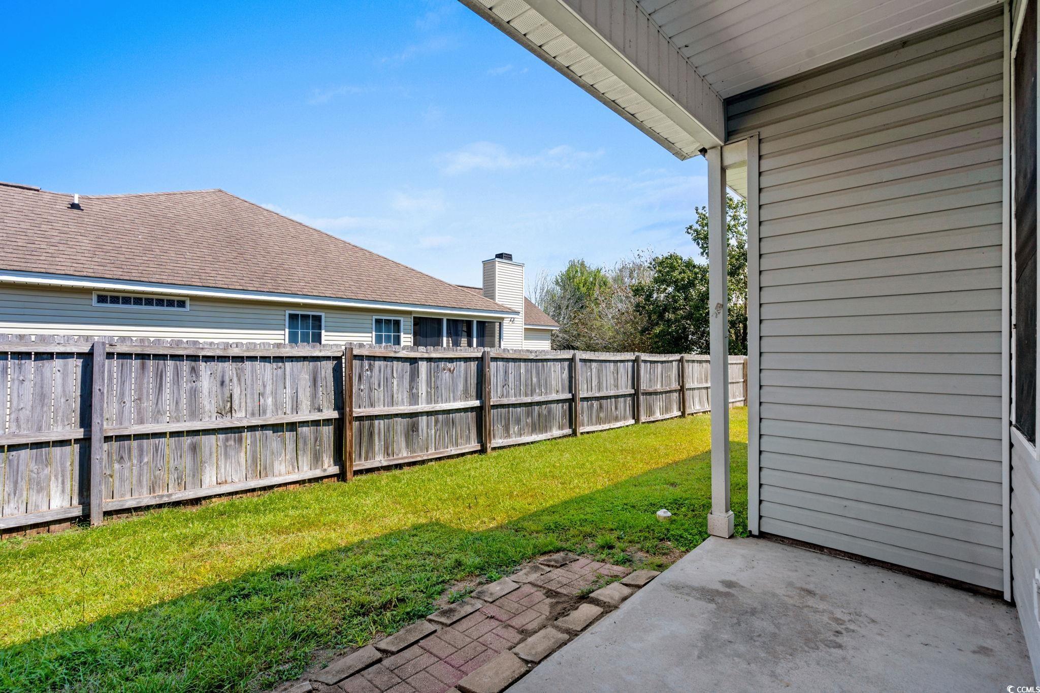 2723 Canvasback Trail Myrtle Beach, SC 29588 - Photo 28 of 40 Fenced backyard featuring a patio area