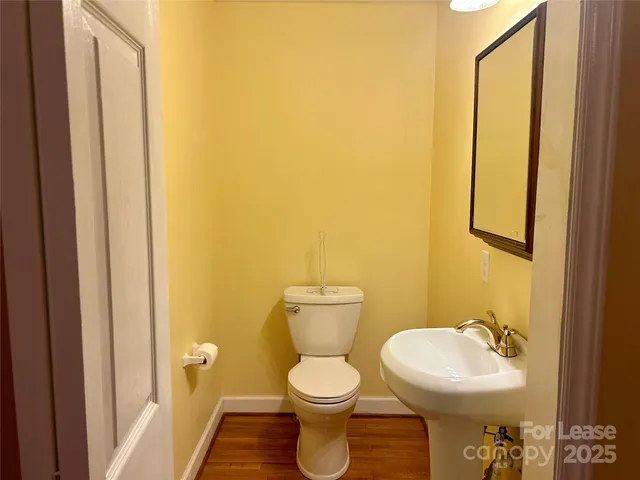 a bathroom with a toilet and a sink