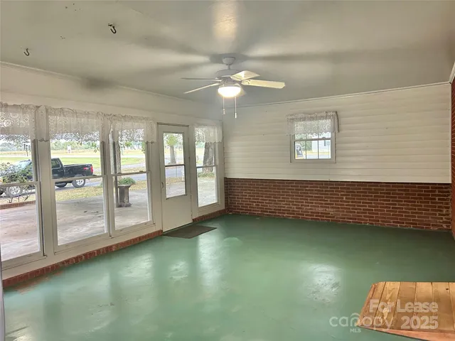 a view of front door of house and window