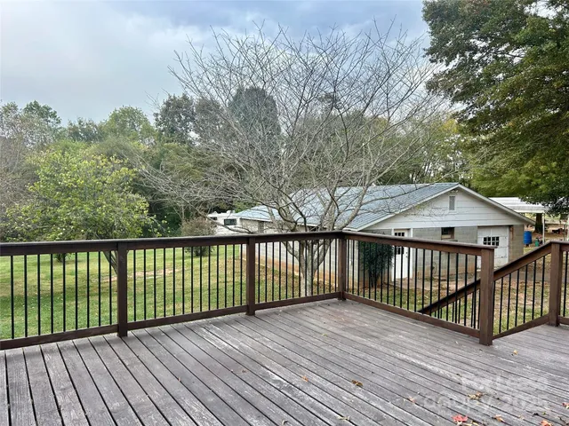 a view of a wooden roof deck