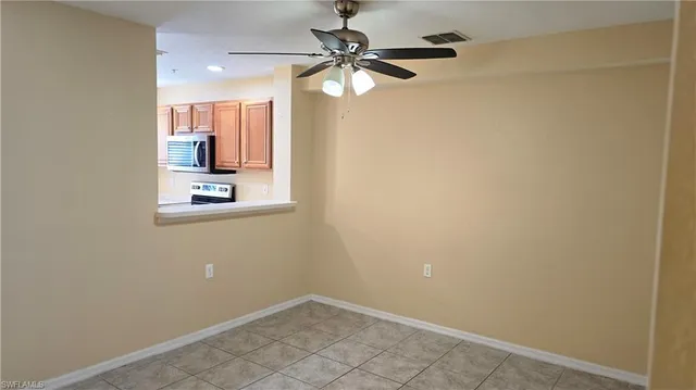 a view of a hallway with a bathroom
