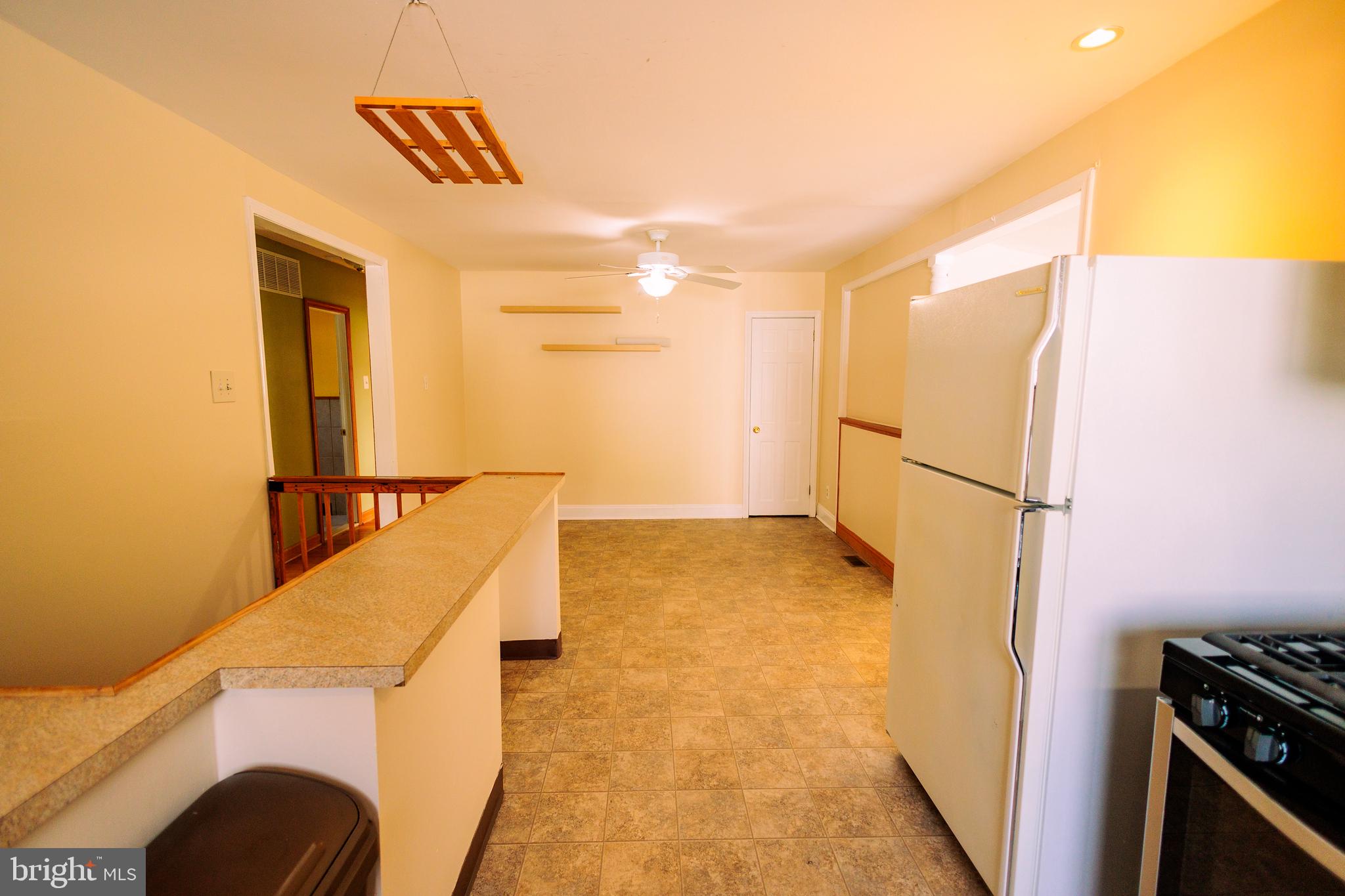222 MacClelland Avenue Glassboro, NJ 08028 - Photo 14 of 37 a view of a kitchen from a hallway