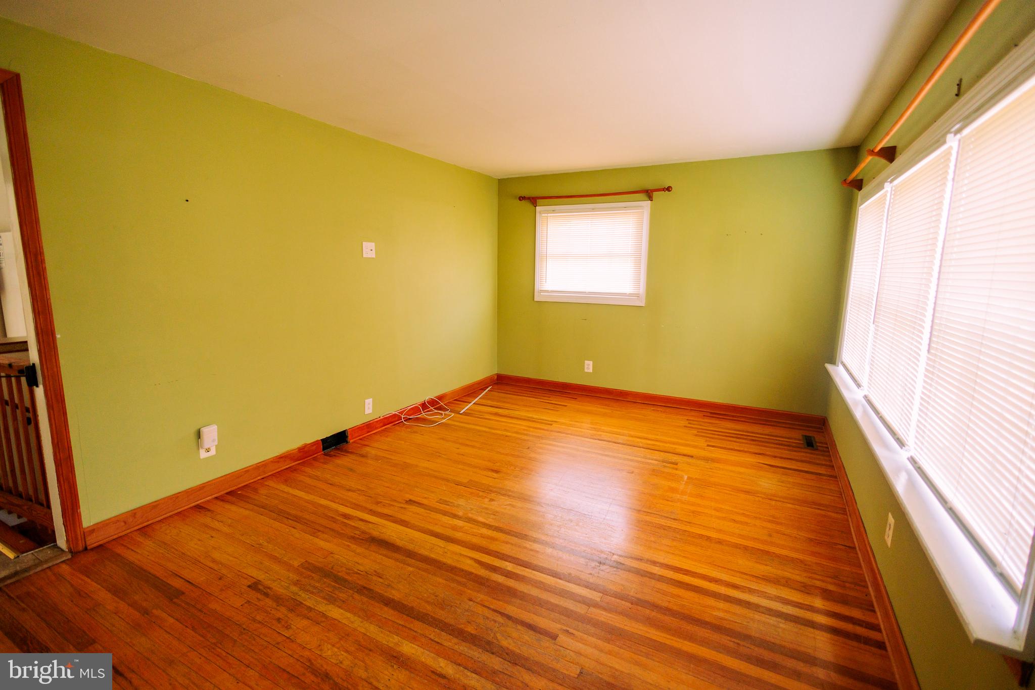 222 MacClelland Avenue Glassboro, NJ 08028 - Photo 20 of 37 a view of empty room with wooden floor and fan