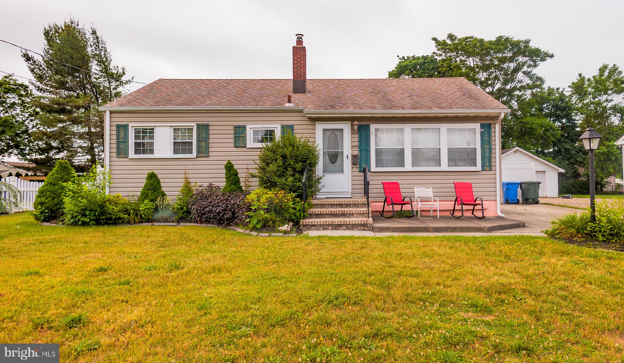 222 MacClelland Avenue Glassboro, NJ 08028 - Photo 2 of 37 a front view of house with yard and swimming pool