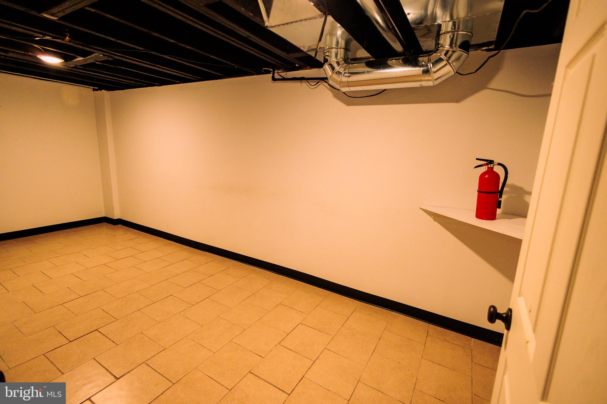 222 MacClelland Avenue Glassboro, NJ 08028 - Photo 29 of 37 a view of a room with racks on the wall