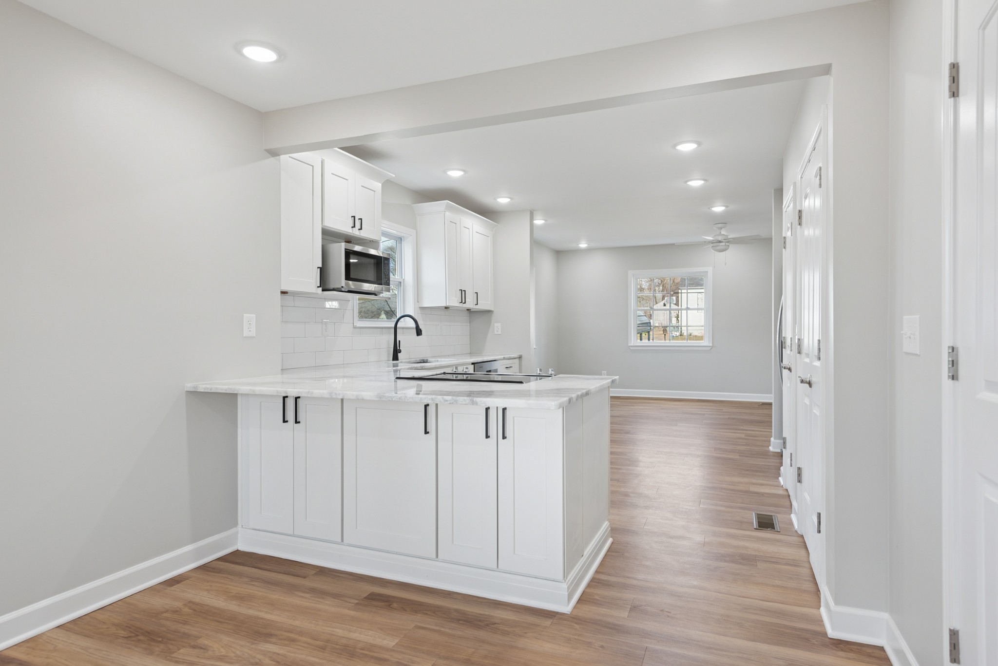 112 Wiley Street Madison, TN 37115 - Photo 19 of 43 a kitchen with white cabinets and sink
