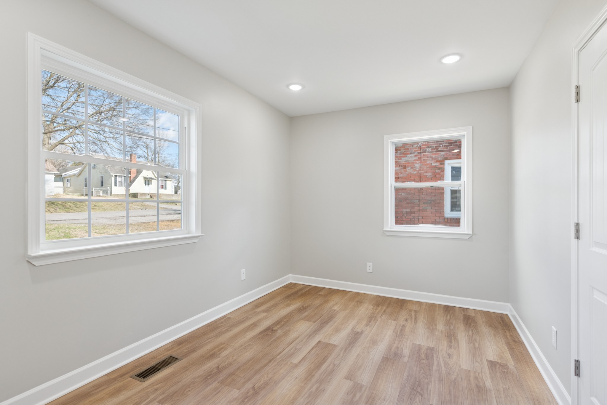 112 Wiley Street Madison, TN 37115 - Photo 37 of 43 a view of empty room with wooden floor and fan