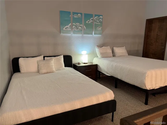 a view of a balcony with chairs