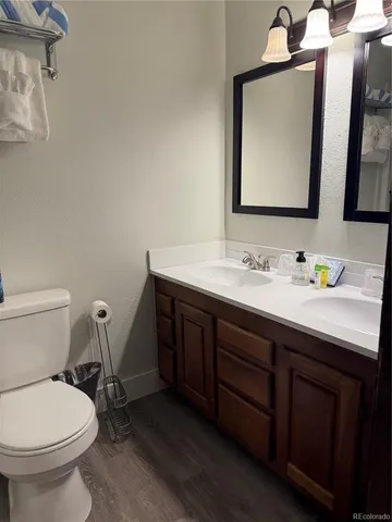 a swimming pool with outdoor seating and yard