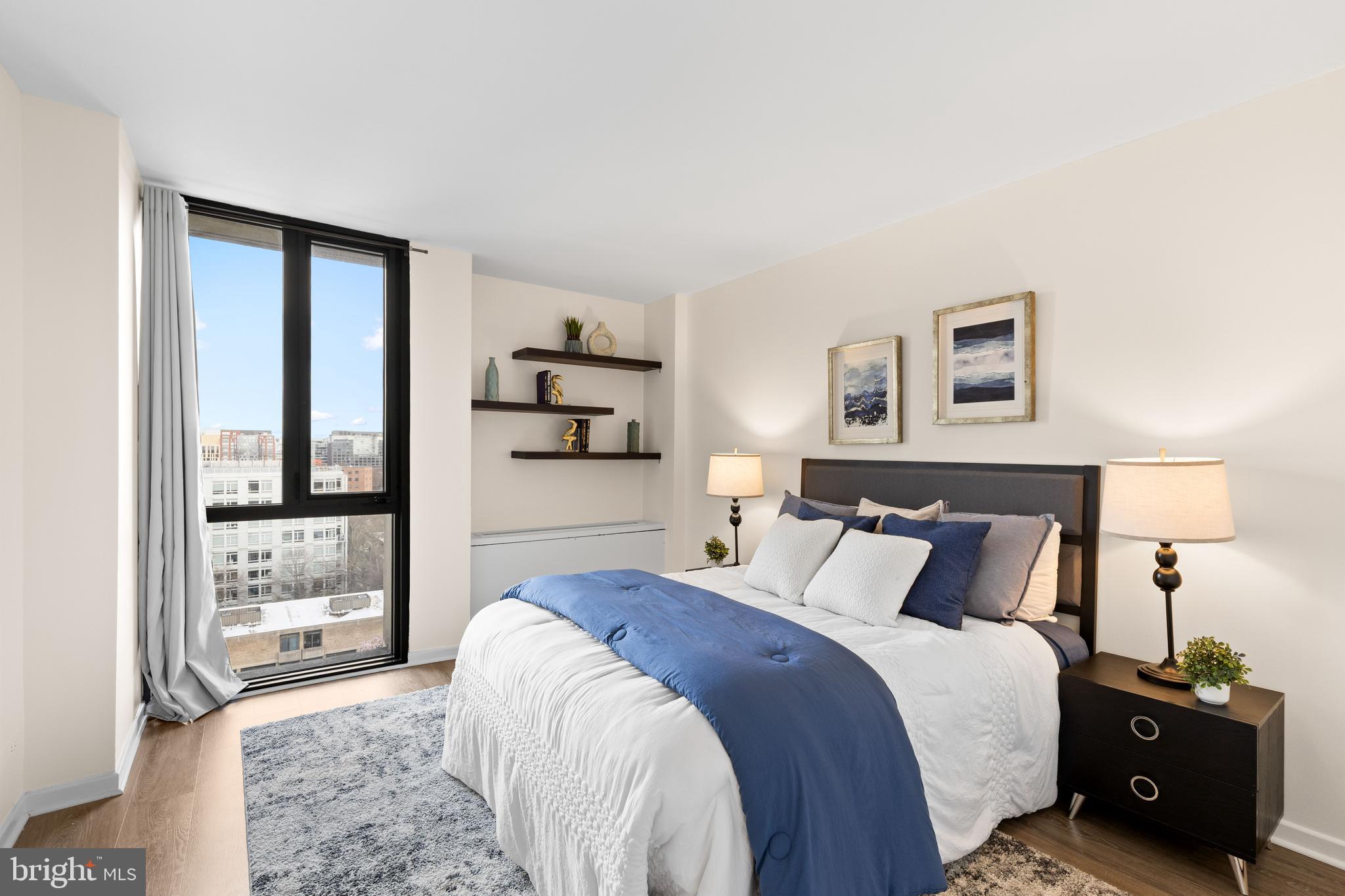 300 M Street Southwest, Unit N808 Washington, DC 20024 - Photo 19 of 36 a bedroom with a bed and a window