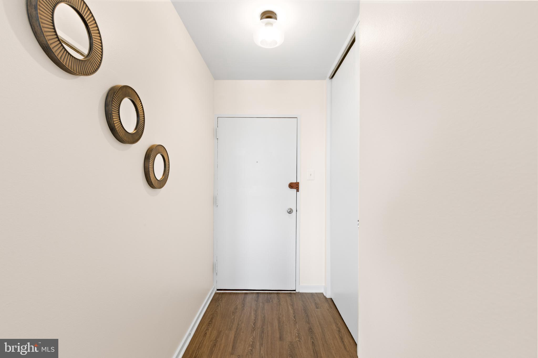 300 M Street Southwest, Unit N808 Washington, DC 20024 - Photo 2 of 36 a view of a hallway with window