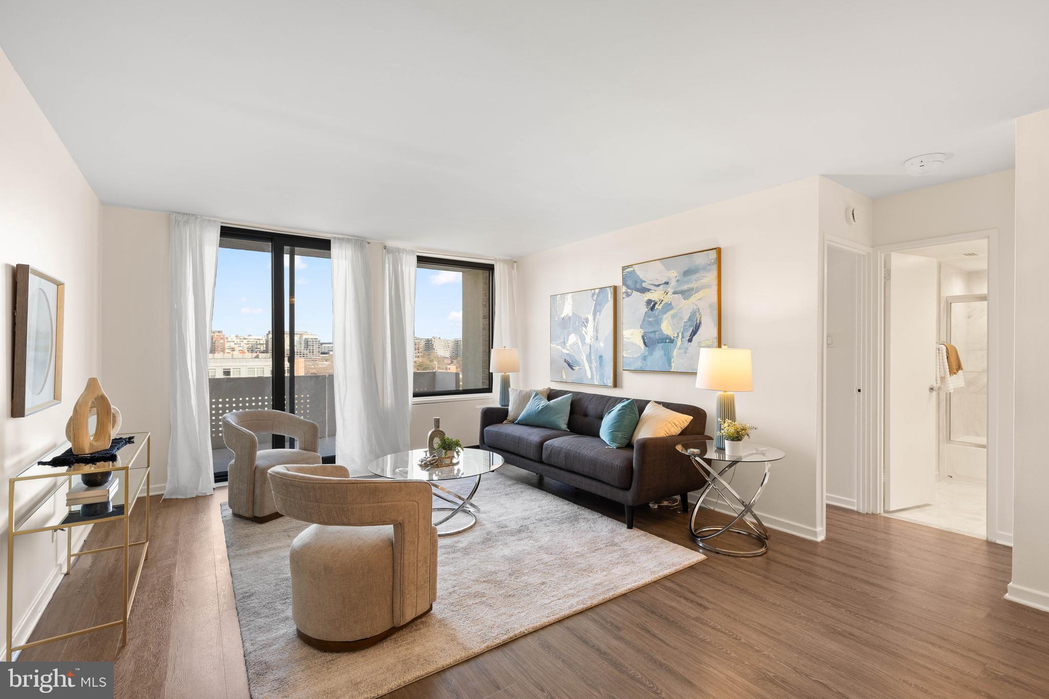 300 M Street Southwest, Unit N808 Washington, DC 20024 - Photo 4 of 36 a living room with furniture and a large window