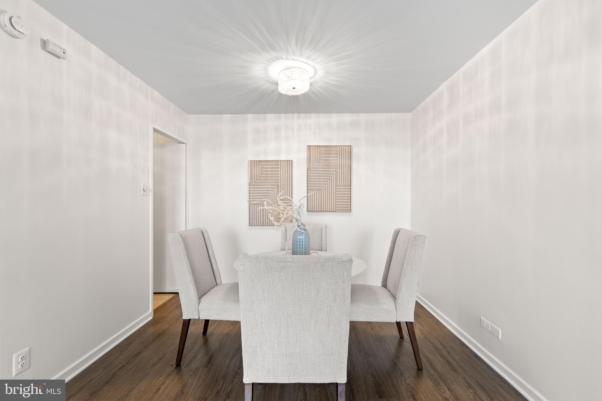 300 M Street Southwest, Unit N808 Washington, DC 20024 - Photo 10 of 36 a view of a dining room with furniture and wooden floor
