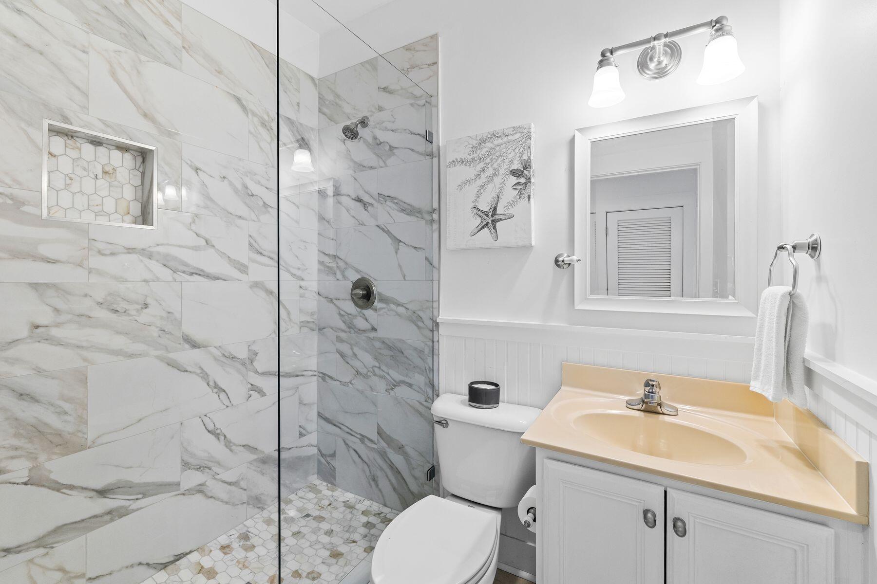 150 Cottage Way, Unit 20 Inlet Beach, FL 32461 - Photo 15 of 38 a bathroom with a sink toilet and shower