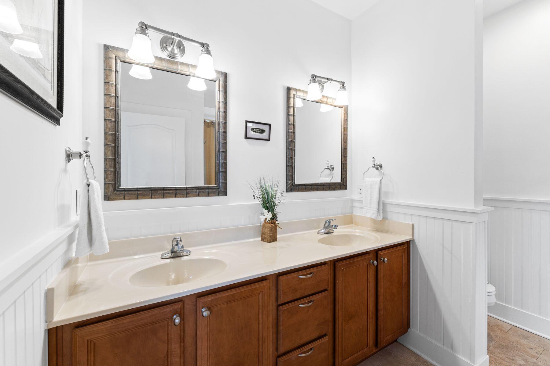150 Cottage Way, Unit 20 Inlet Beach, FL 32461 - Photo 17 of 38 a bathroom with a double vanity sink and a mirror