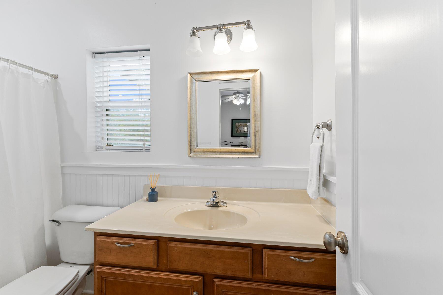 150 Cottage Way, Unit 20 Inlet Beach, FL 32461 - Photo 23 of 38 a bathroom with a sink and a toilet