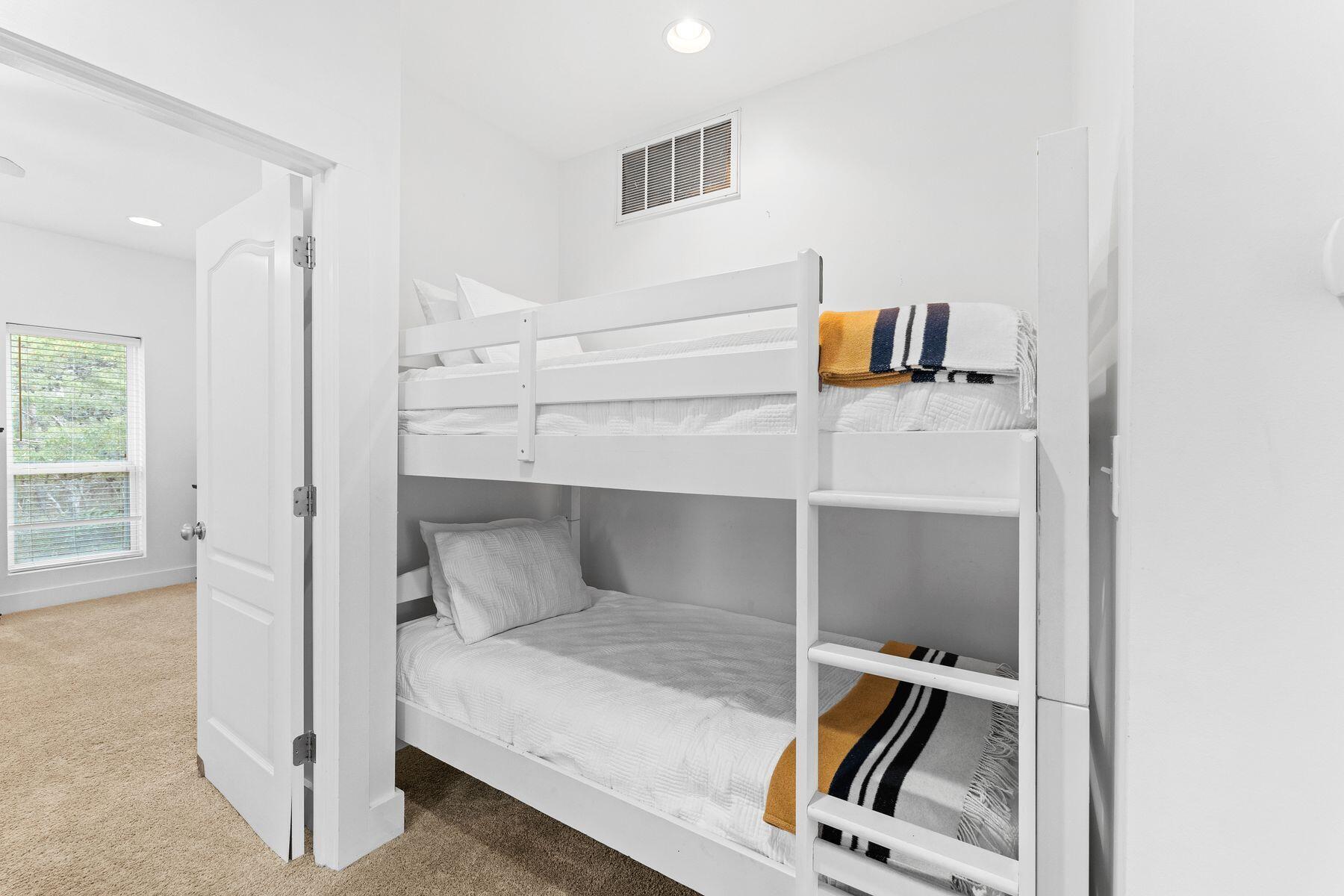 150 Cottage Way, Unit 20 Inlet Beach, FL 32461 - Photo 30 of 38 a bedroom with a bed and a tv