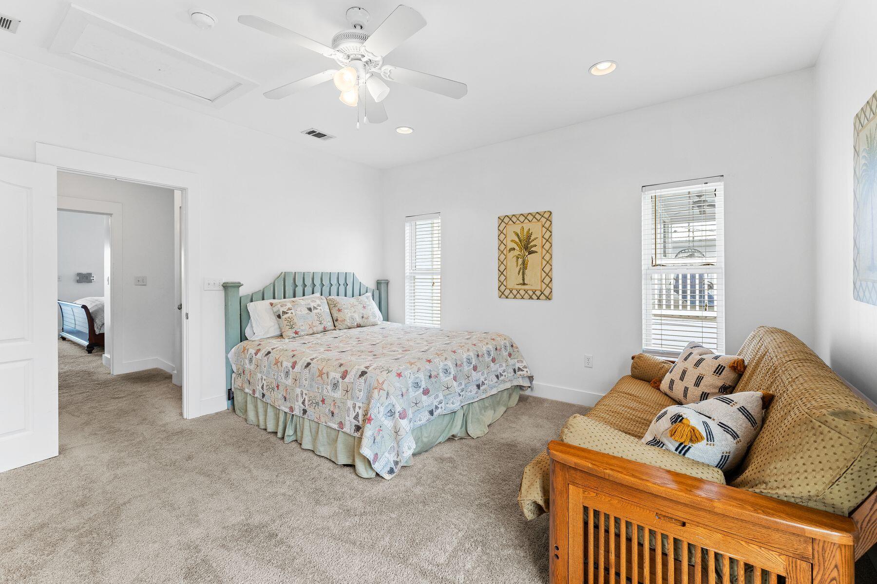 150 Cottage Way, Unit 20 Inlet Beach, FL 32461 - Photo 31 of 38 a bedroom with a bed and ceiling fan