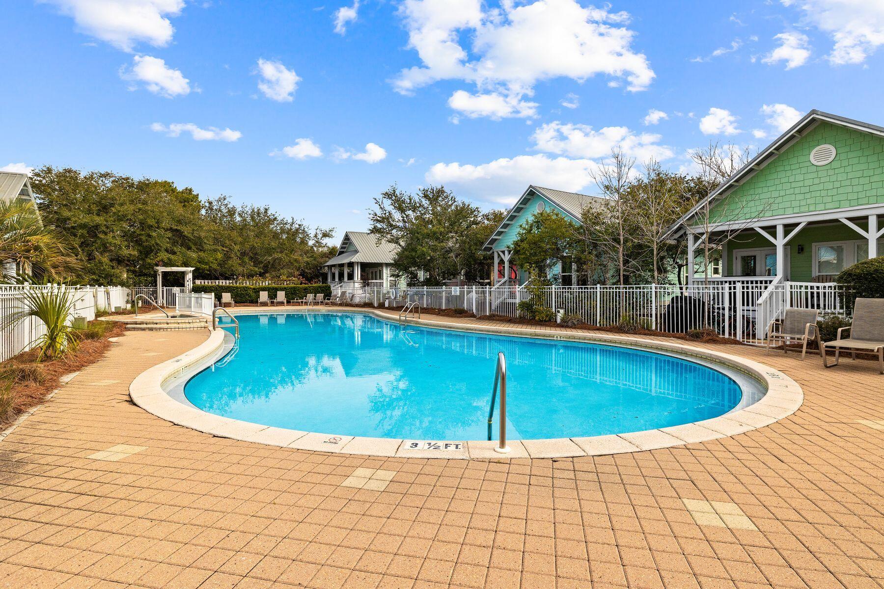 150 Cottage Way, Unit 20 Inlet Beach, FL 32461 - Photo 37 of 38 a view of a swimming pool with a yard