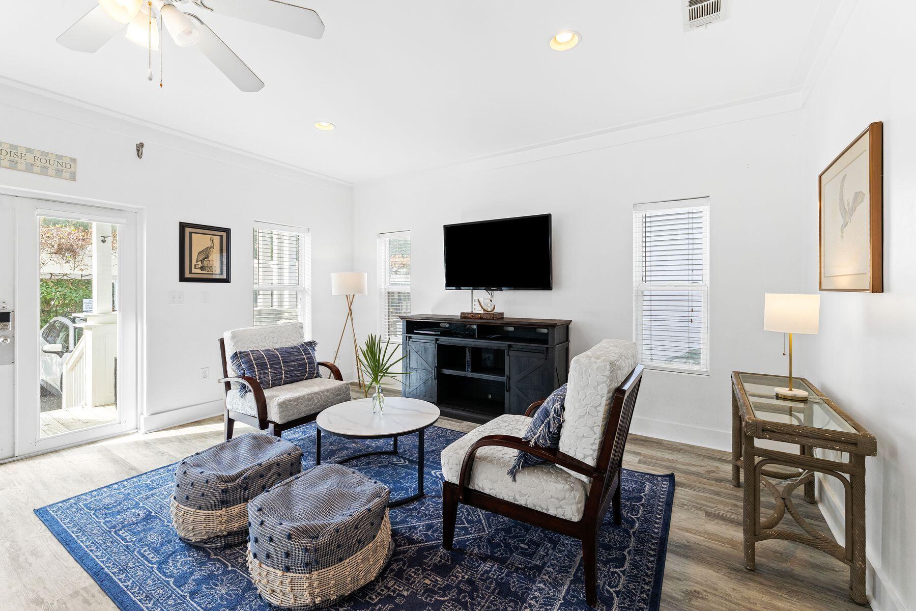 150 Cottage Way, Unit 20 Inlet Beach, FL 32461 - Photo 10 of 38 a living room with furniture and a flat screen tv