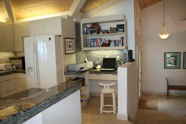 2574 Hoonani Road Koloa, HI 96756 - Photo 6 of 12 a work place with a couch and a bookshelf