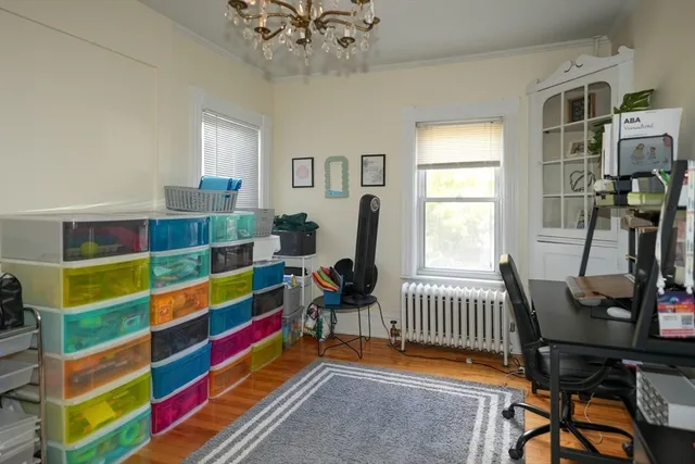 a room with musical instruments and windows