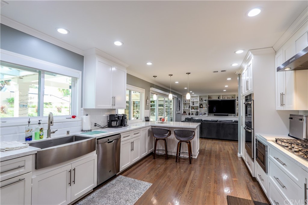 3213 Twilight Drive Fullerton, CA 92835 - Photo 11 of 47 a large kitchen with stainless steel appliances lots of counter space and a sink