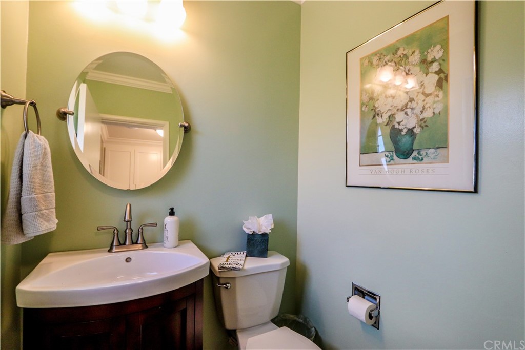 3213 Twilight Drive Fullerton, CA 92835 - Photo 13 of 47 a bathroom with a toilet a sink and a mirror