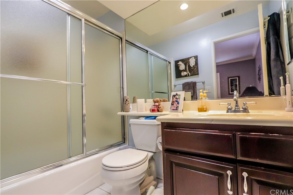 3213 Twilight Drive Fullerton, CA 92835 - Photo 18 of 47 a bathroom with a sink a toilet and shower