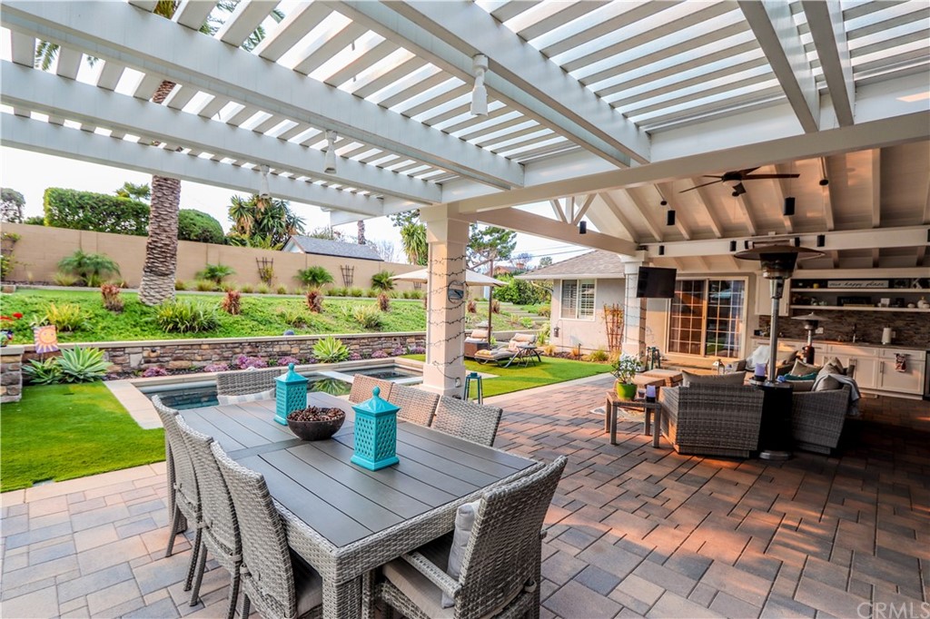 3213 Twilight Drive Fullerton, CA 92835 - Photo 23 of 47 a view of a patio with lawn chairs and wooden floor