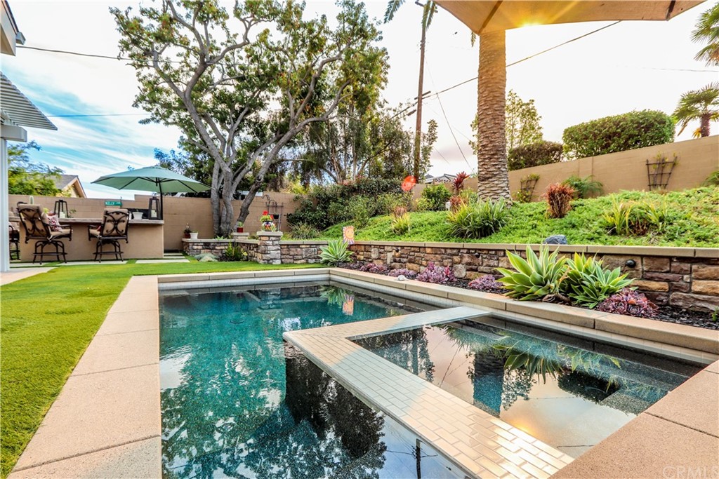 3213 Twilight Drive Fullerton, CA 92835 - Photo 26 of 47 a view of a swimming pool with outdoor seating and plants