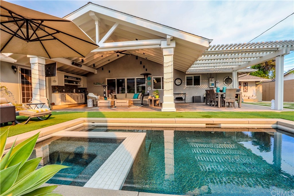 3213 Twilight Drive Fullerton, CA 92835 - Photo 27 of 47 a swimming pool with outdoor seating and yard