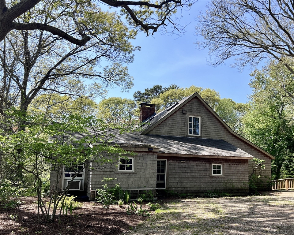 225 Lamberts Cove Road West Tisbury, MA 02568 - Photo 1 of 33 a view of a house with a yard