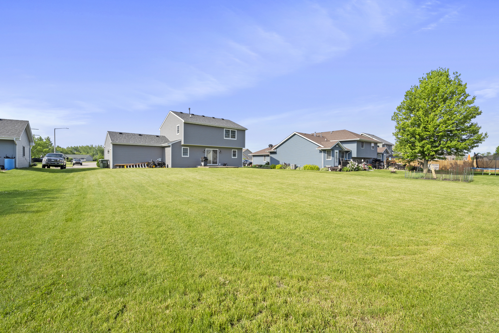 522 Hunters Run Coal City, IL 60416 - Photo 23 of 24 a view of a lake with houses in the background